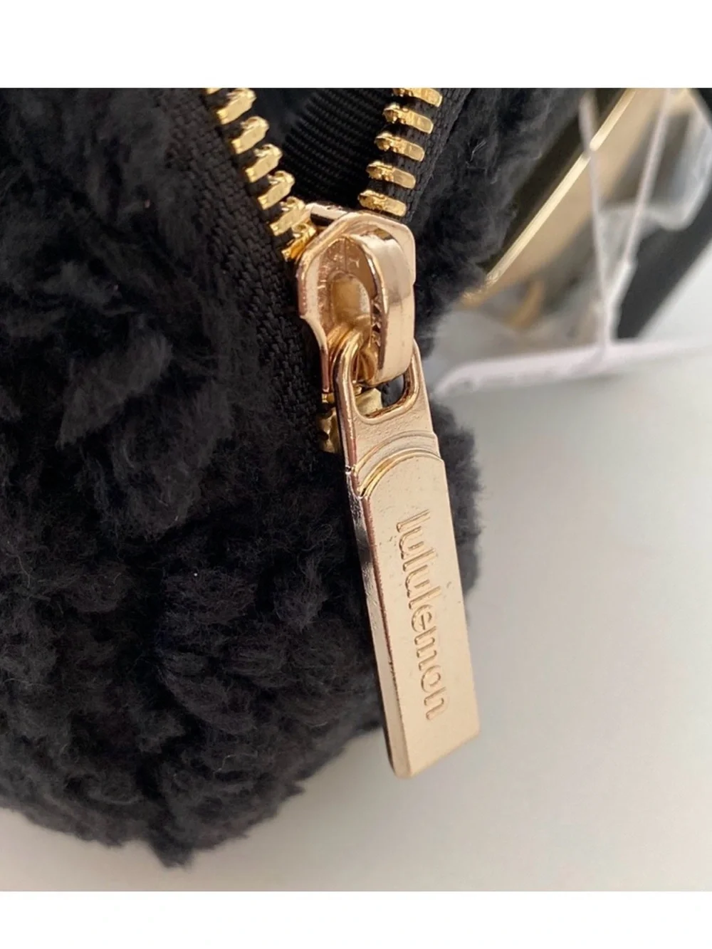 lululemon Black Sherpa Pouch with Gold Hardware